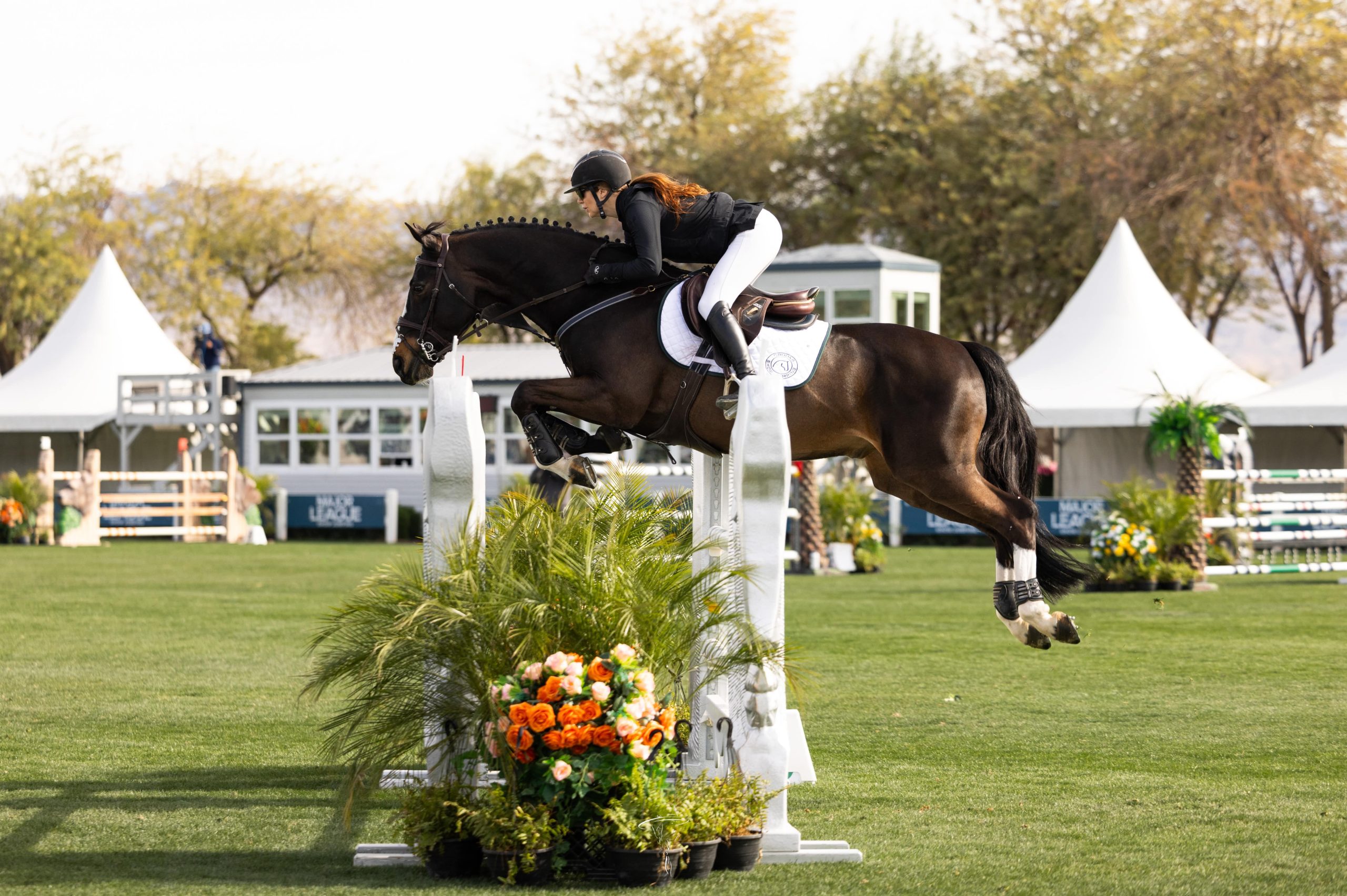 Whitney Wickes riding a horse