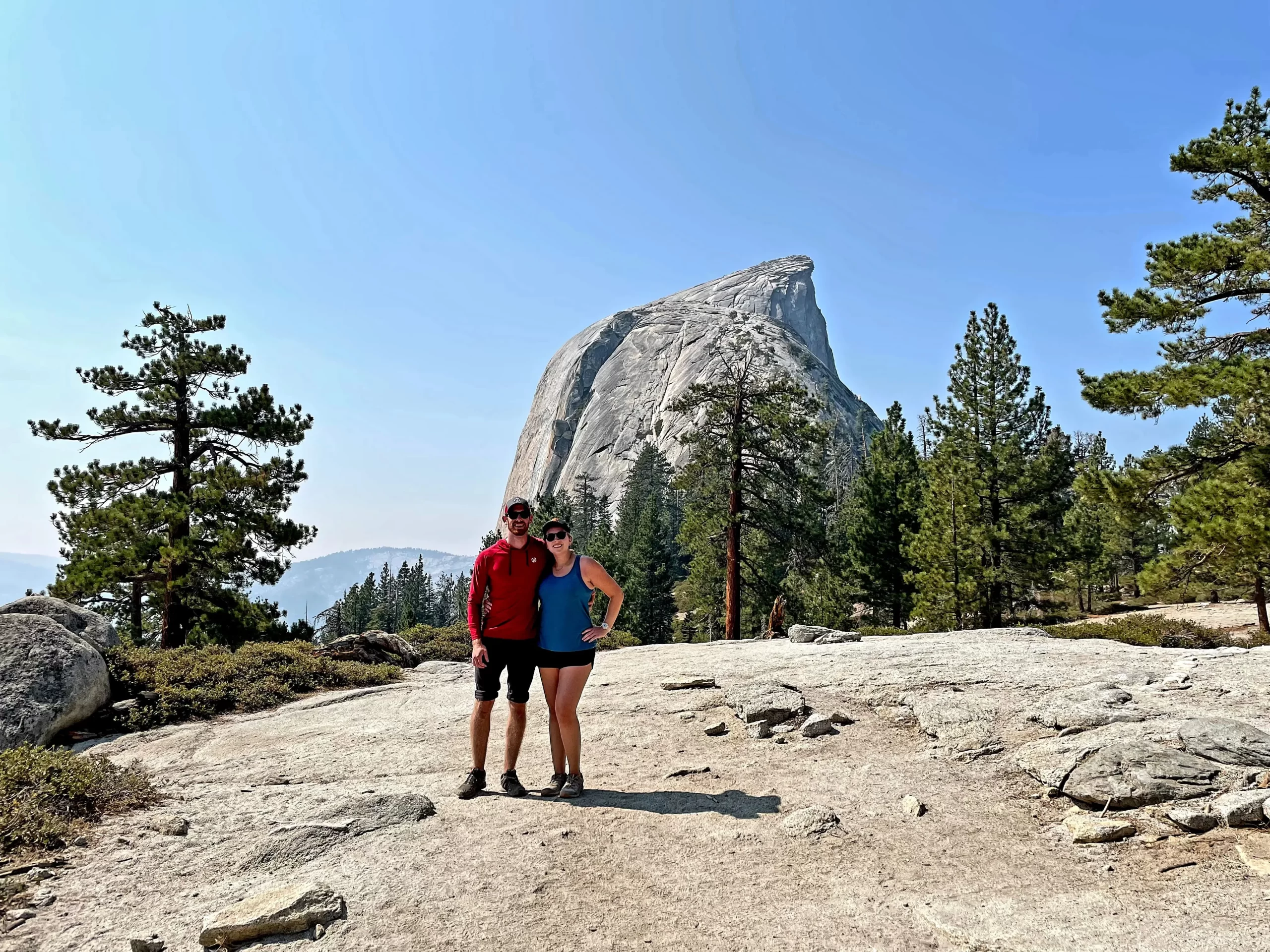 Andrea Moritz and her significant other standing on a rocky mountain
